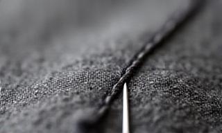 Close up of hand-stitched detailing